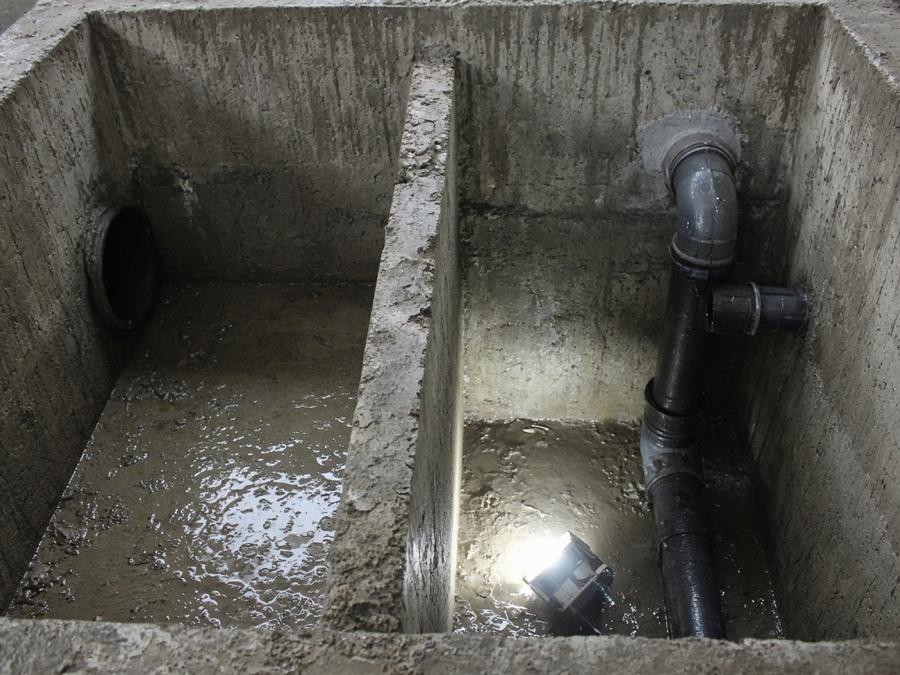 Baffle wall and tee fitting replacement inside an emptied chamber — Grease Trap Installation, Repair & Replacement in Fullerton, CA